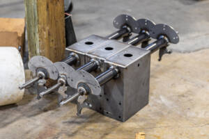 A photo of some welded metal parts that Yoder Industries welded.