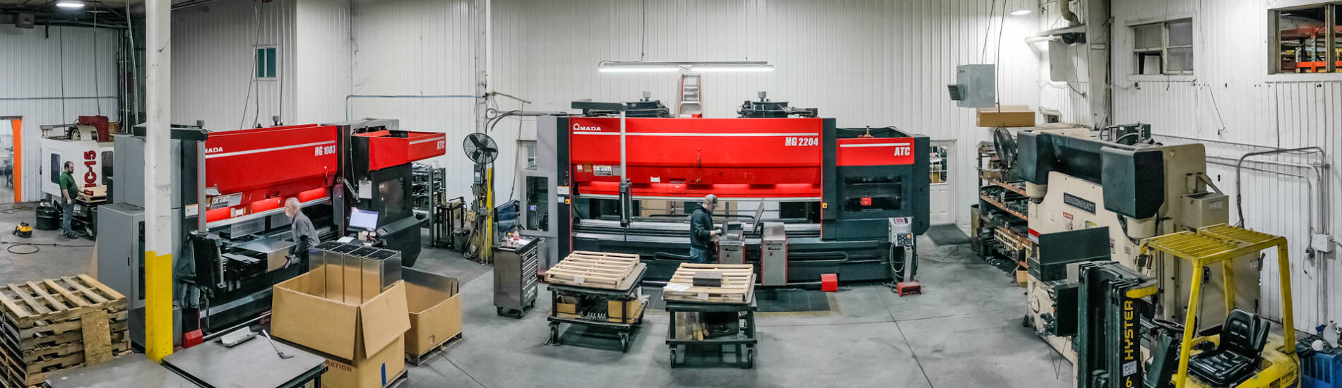 A Panorama shot of employees running CNC Press Brake machines at Yoder Industries.