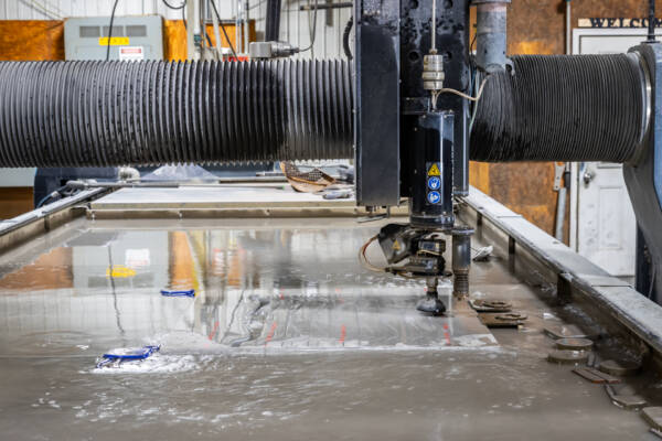 https://www.yoderind.com/wp-content/uploads/water-jet-cutting/Water-Jet-Cutting-Lancaster-PA.jpg